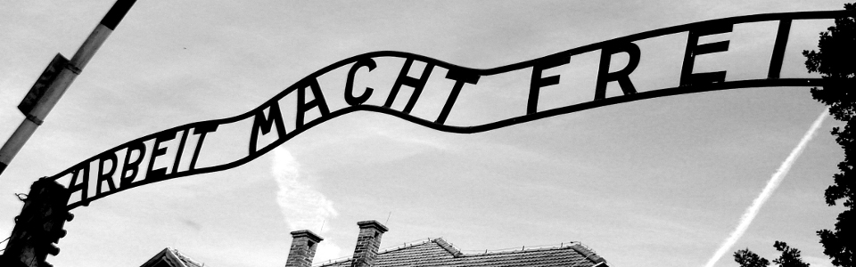 Infamous sing 'Arbeit Macht Frei' in Auschwitz I